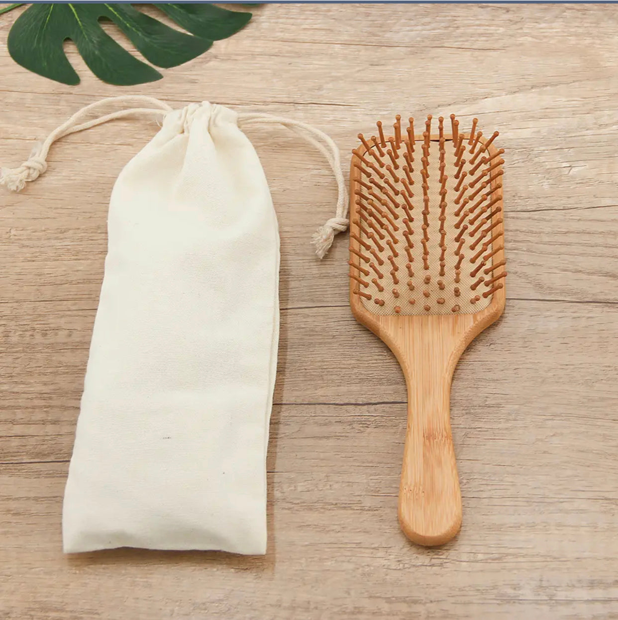 Eco- Friendly paddle Hair Brush With Organic Cotton Bag for Women, Men and Kids gives you Healthy Hair